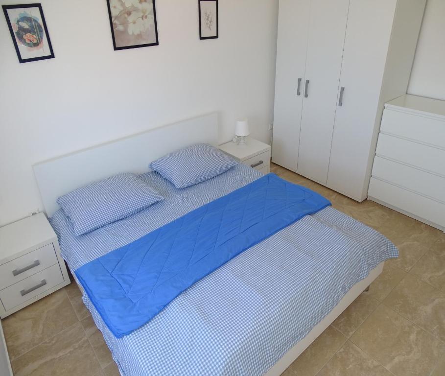 Postel nebo postele na pokoji v ubytování Apartmani David