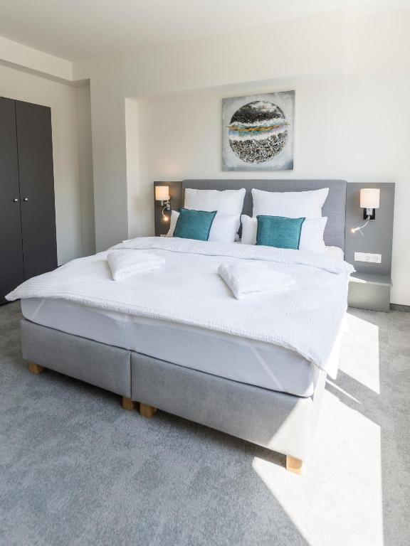 Postel nebo postele na pokoji v ubytování Vienna Cube Apartments Contactless Check IN