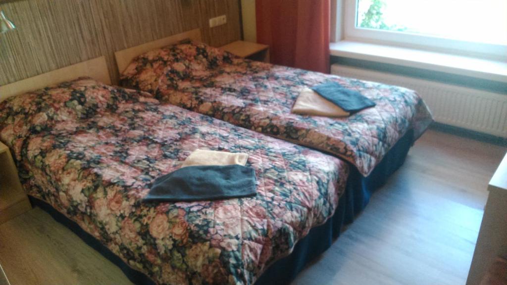 Postel nebo postele na pokoji v ubytování Ranna Villa & FREE PARKING
