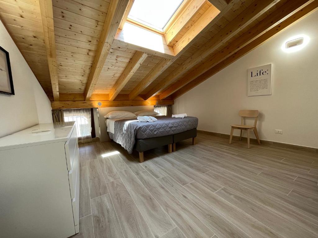 Łóżko lub łóżka w pokoju w obiekcie Anfite Apartments Santa Maria