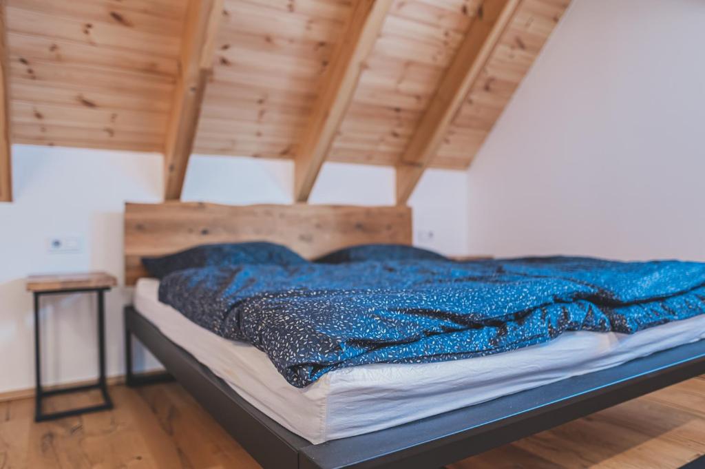 Postel nebo postele na pokoji v ubytování Apartmány Pod Jelenkou