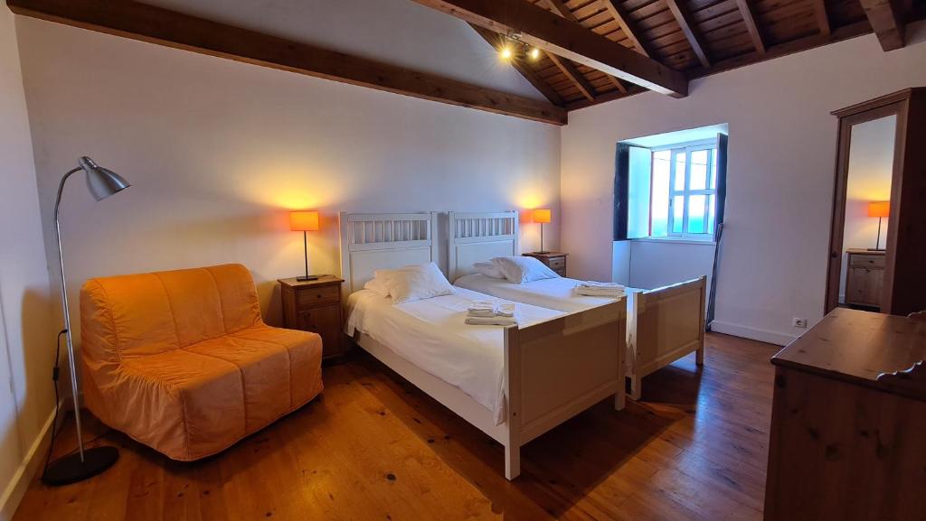 Postel nebo postele na pokoji v ubytování Casas D'Arramada