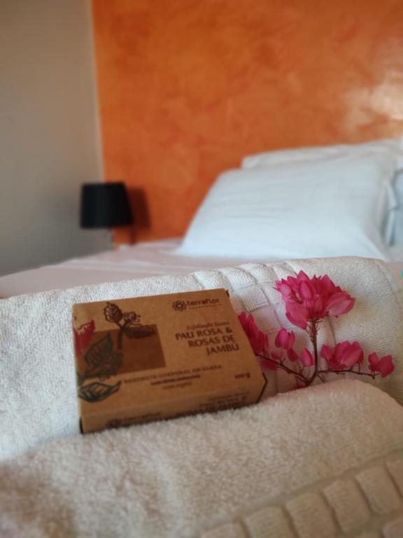Postel nebo postele na pokoji v ubytování SPA&Hospedagem Giovannini