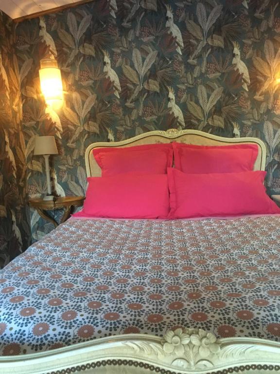 En eller flere senge i et værelse på Auprès du château 2