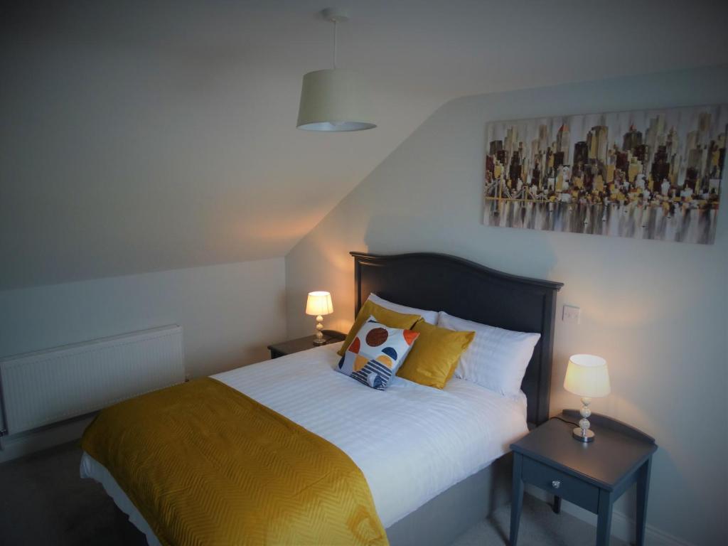 Voodi või voodid majutusasutuse Lir Lodge toas
