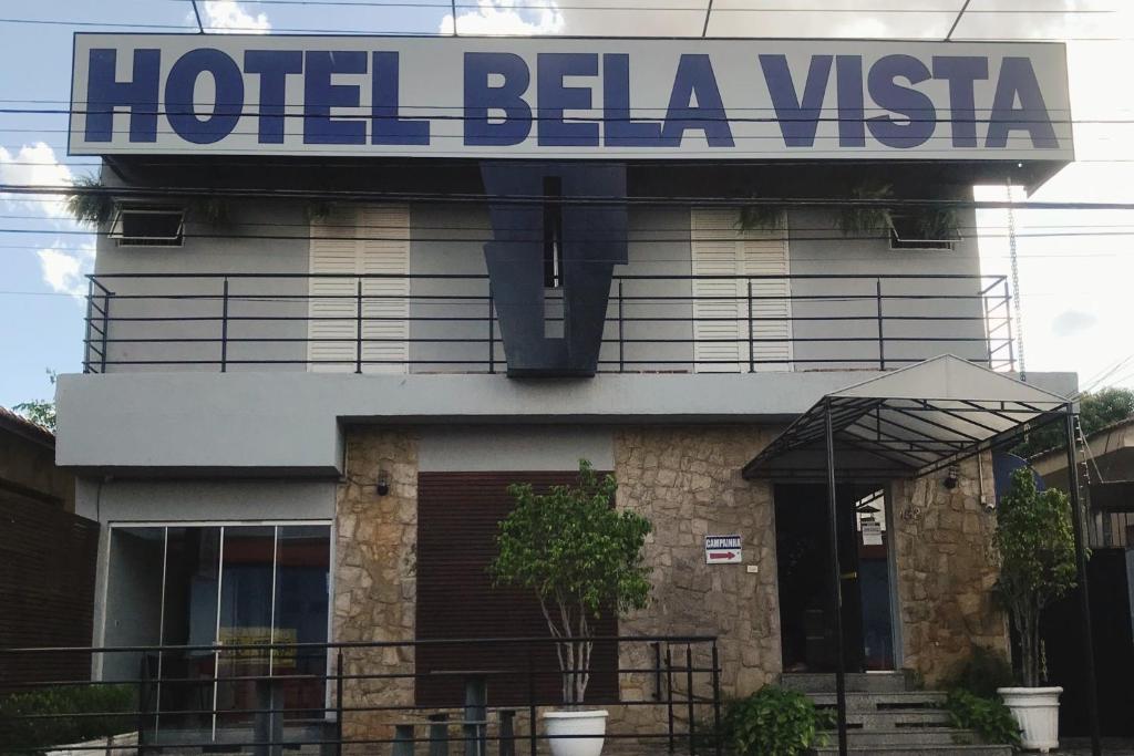 a hotel bella vista sign on the side of a building at HOTEL BELA VISTA NOVA ODESSA in Nova Odessa