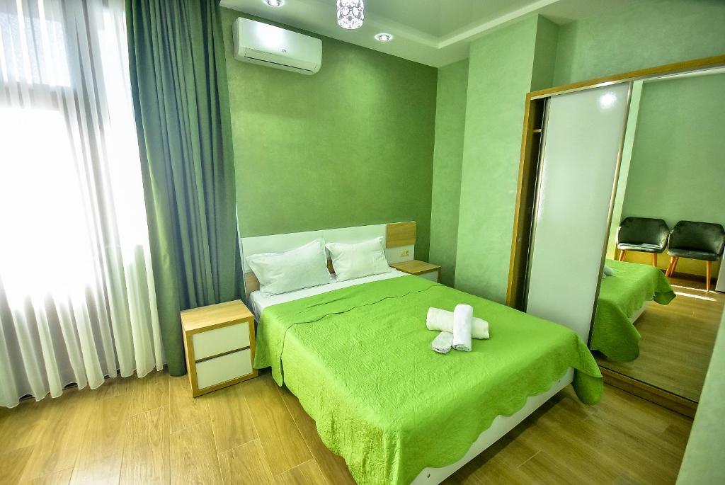 Postel nebo postele na pokoji v ubytování Hotel RANU