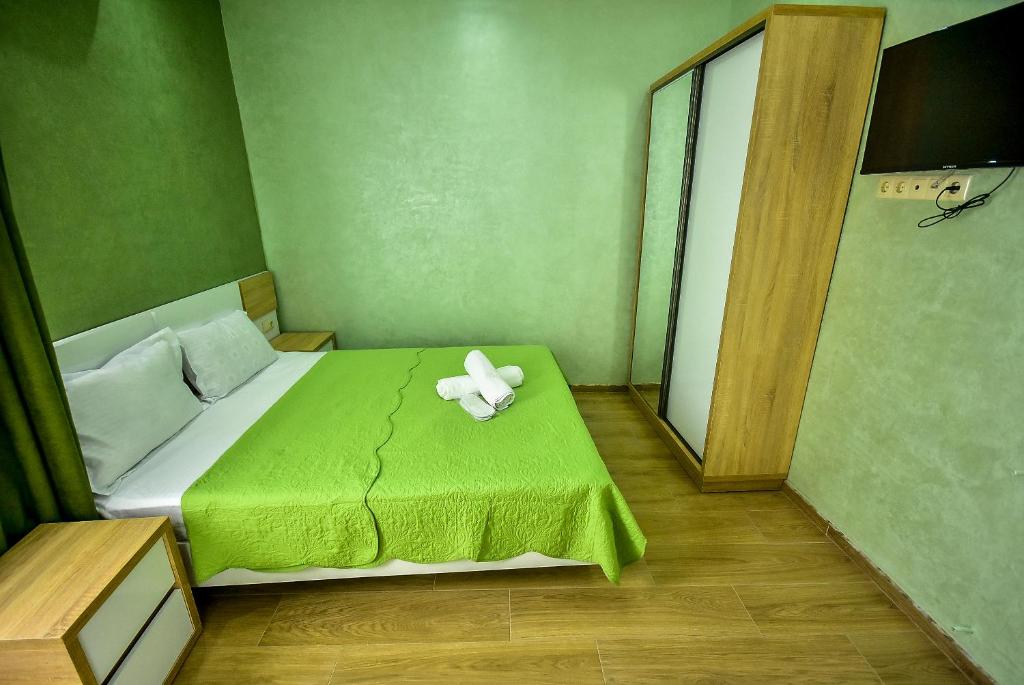 Postel nebo postele na pokoji v ubytování Hotel RANU