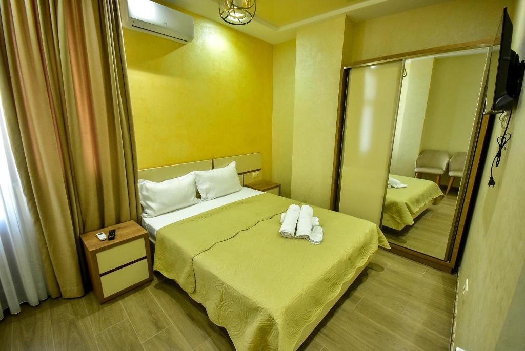 Postel nebo postele na pokoji v ubytování Hotel RANU