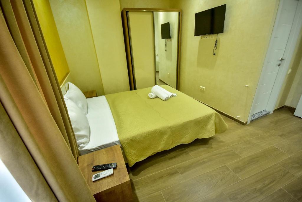 Postel nebo postele na pokoji v ubytování Hotel RANU