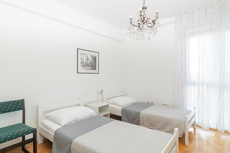 Posteľ alebo postele v izbe v ubytovaní Apartment Vlahov