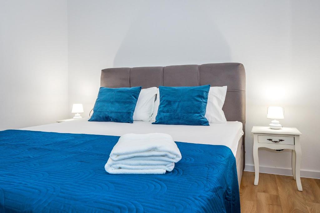 Postel nebo postele na pokoji v ubytování Apartment Oli