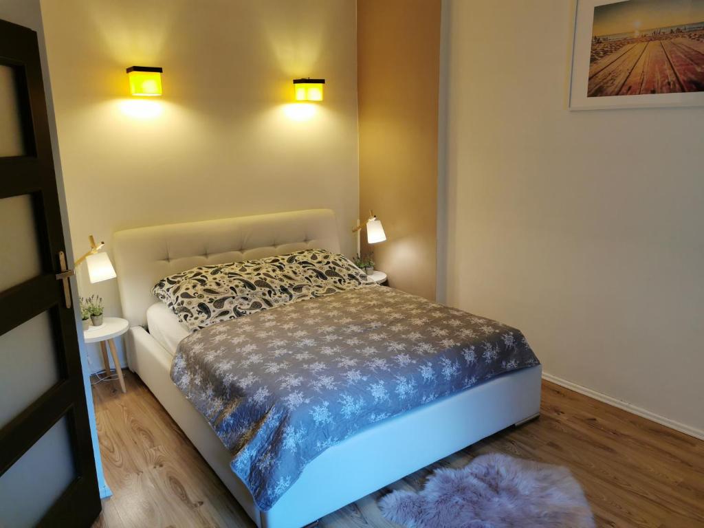 Łóżko lub łóżka w pokoju w obiekcie Monte Cassino 6A Apartament 700m plaża