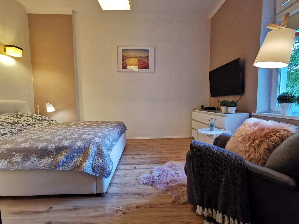
Łóżko lub łóżka w pokoju w obiekcie Monte Cassino 6A Apartament 700m plaża

