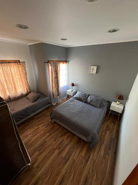 Postel nebo postele na pokoji v ubytování Hostal FloryMar