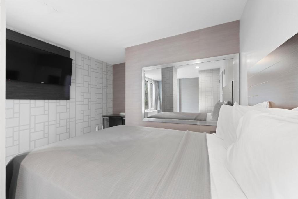 Postel nebo postele na pokoji v ubytování Hotel 365 Bronx - Yankee Stadium
