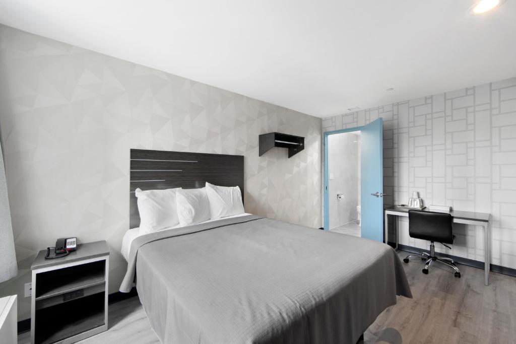 Postel nebo postele na pokoji v ubytování Hotel 365 Bronx - Yankee Stadium
