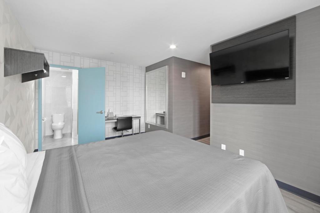 TV a/nebo společenská místnost v ubytování Hotel 365 Bronx - Yankee Stadium