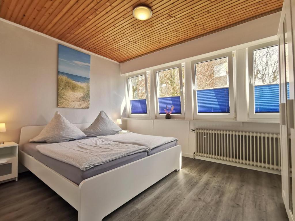 מיטה או מיטות בחדר ב-Südhörn
