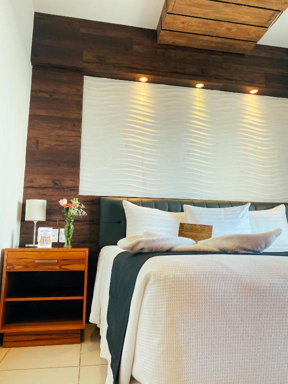 Postel nebo postele na pokoji v ubytování Hotel Clipperton