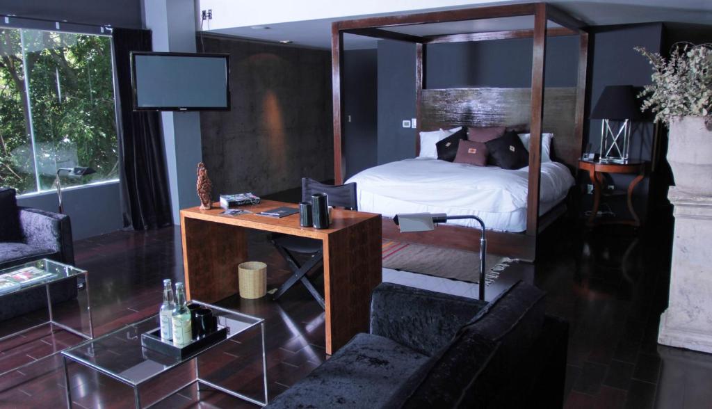 Postel nebo postele na pokoji v ubytování Demetria Hotel