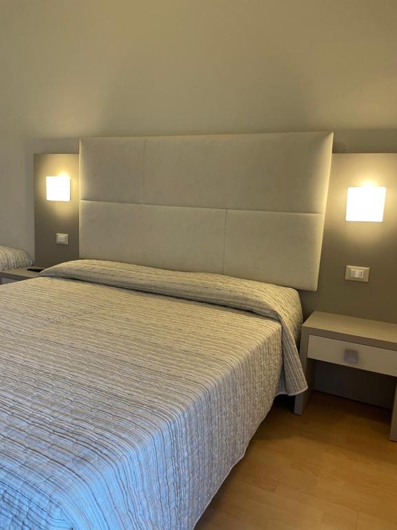 Postel nebo postele na pokoji v ubytování Hotel Vera
