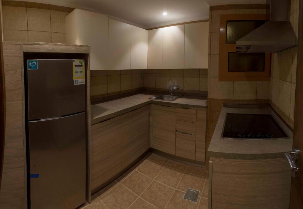 Kuchyň nebo kuchyňský kout v ubytování Al-Borg Hotel