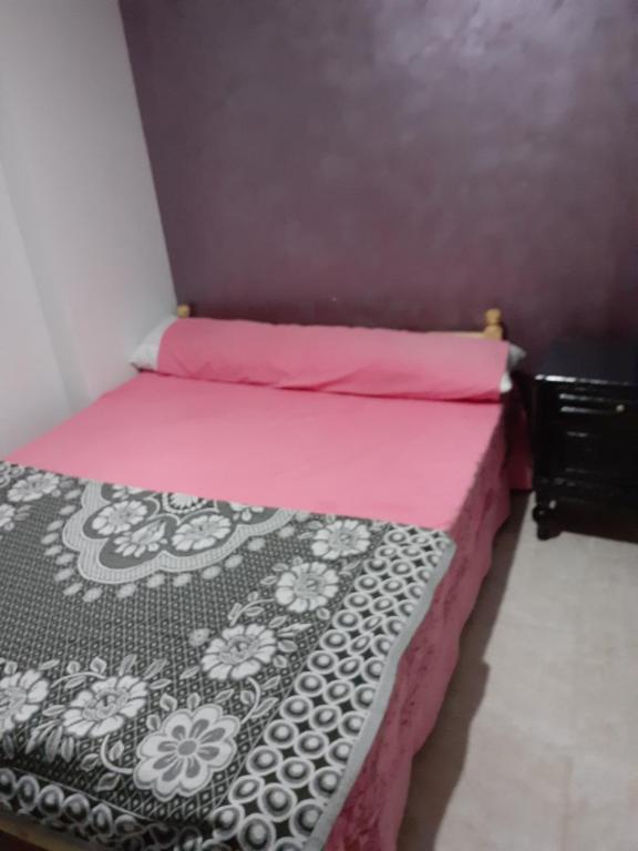 A bed or beds in a room at Free Wi-Fi شقة فندقية فى الاسكندرية New apartment sea view Alexandria