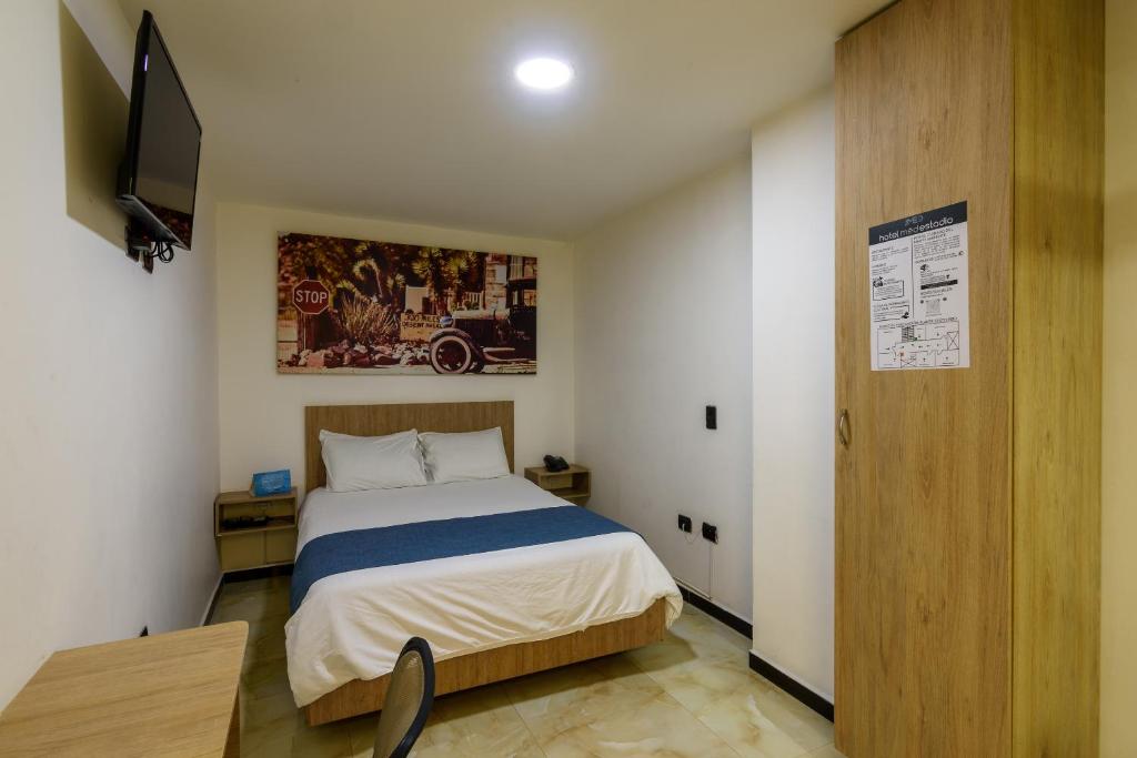 Una cama o camas en una habitación de Hotel Med Estadio