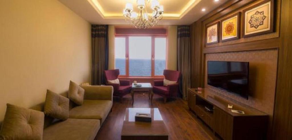 TV a/nebo společenská místnost v ubytování Al-Borg Hotel