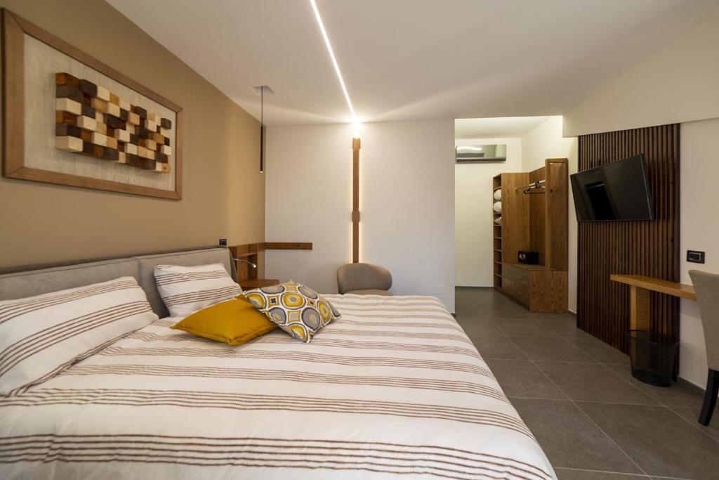 Posteľ alebo postele v izbe v ubytovaní Balneum Rooms & SPA