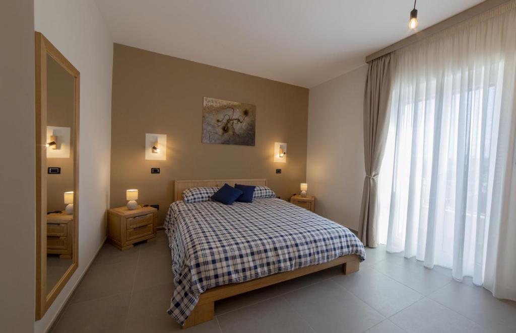 Posteľ alebo postele v izbe v ubytovaní Balneum Rooms & SPA