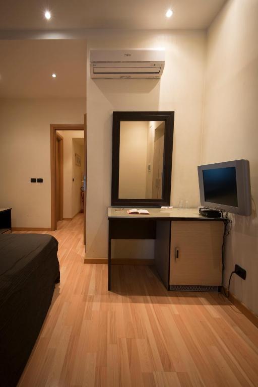 A television and/or entertainment centre at My Rooms