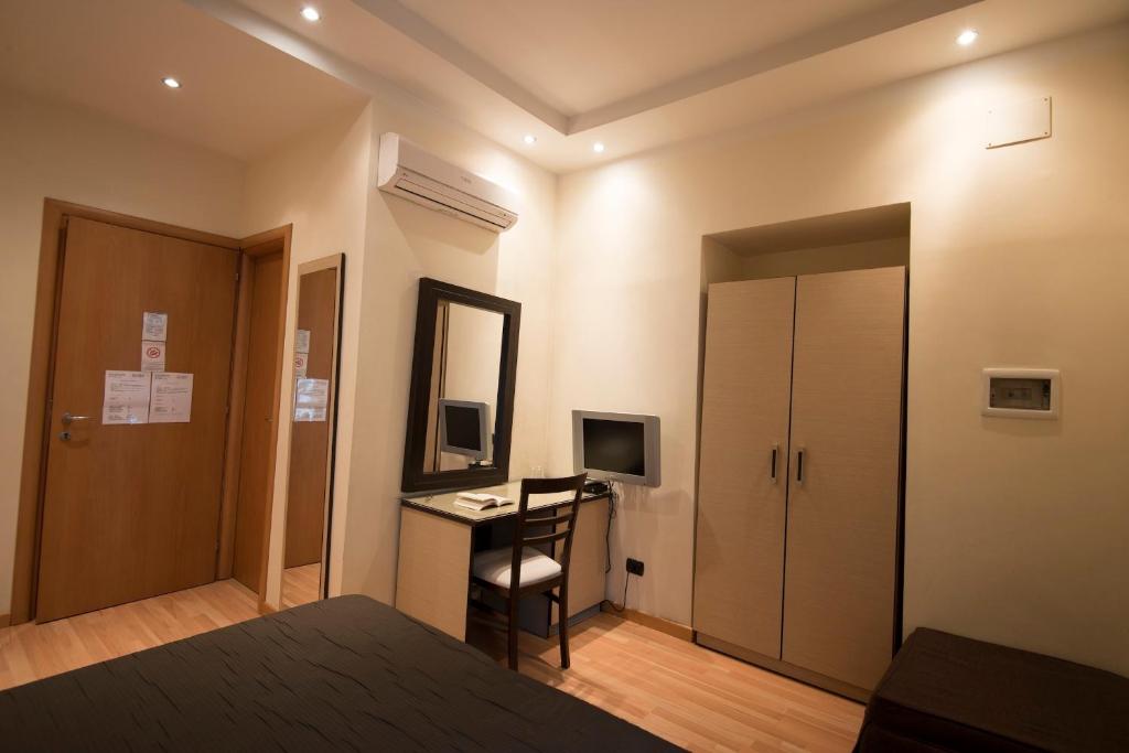 A bed or beds in a room at My Rooms