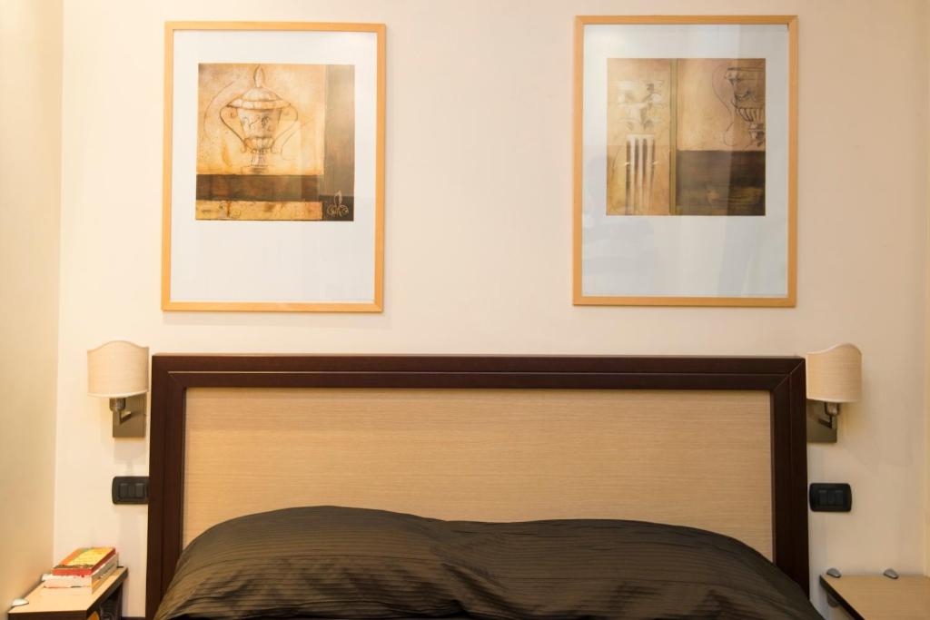 A bed or beds in a room at My Rooms