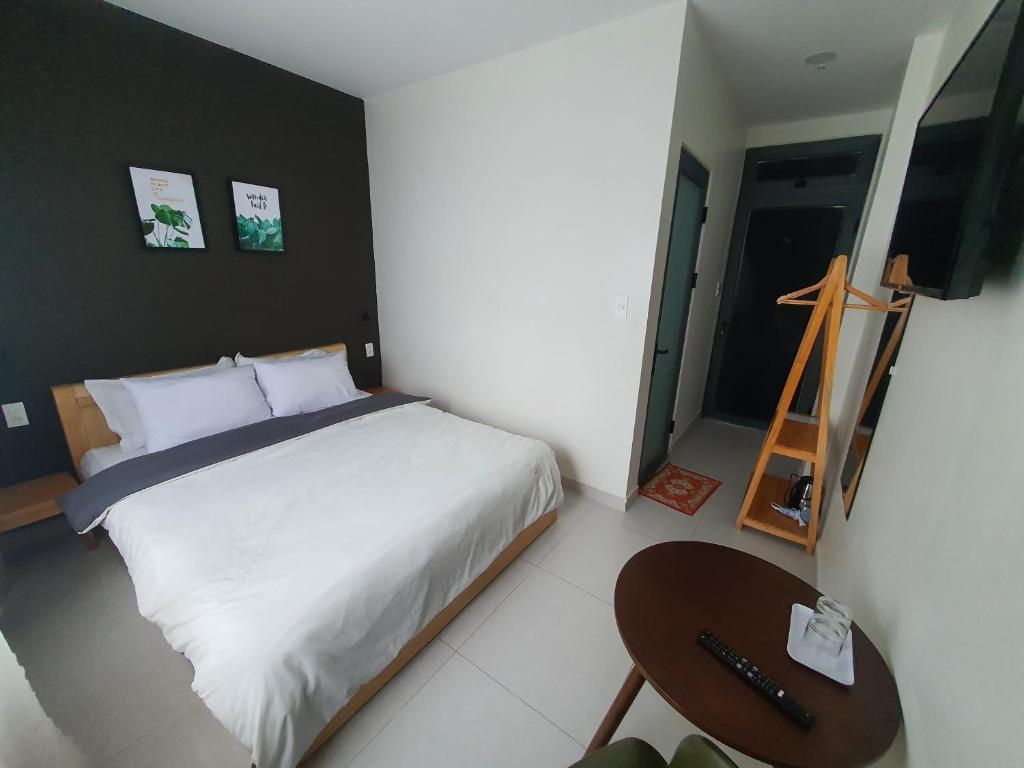Postel nebo postele na pokoji v ubytování Hello Dalat Hostel