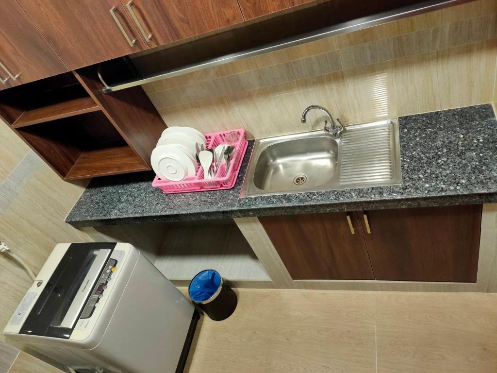 Kuchyň nebo kuchyňský kout v ubytování Hotel Grand United - Ahlone Branch