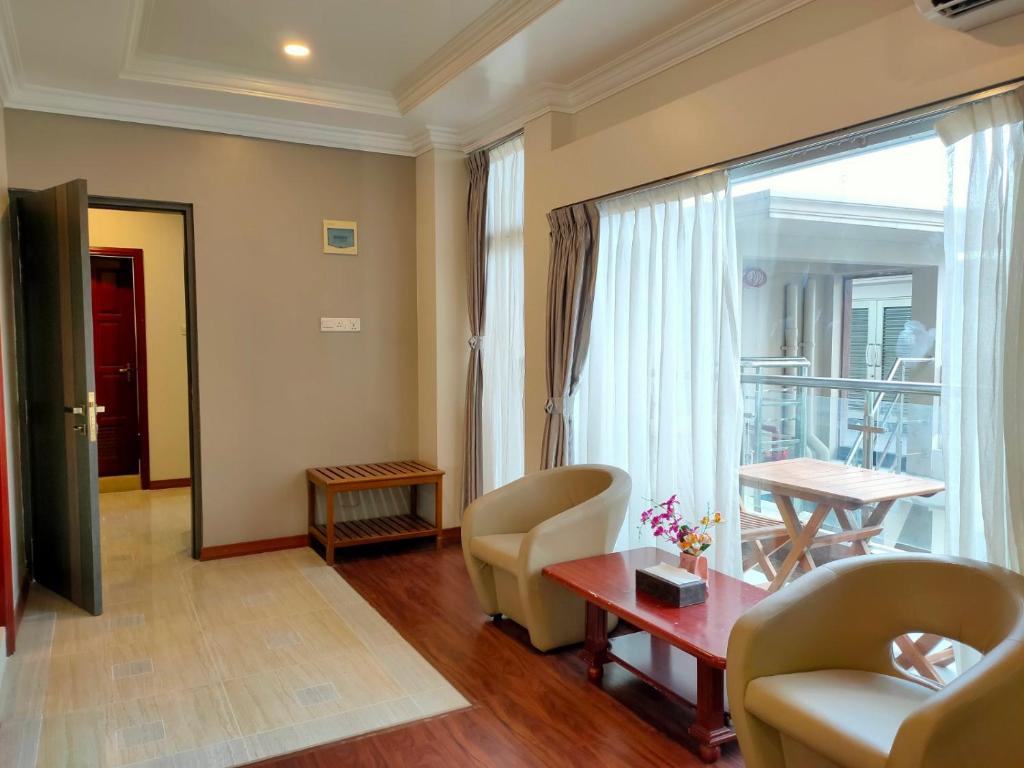 Posezení v ubytování Hotel Grand United - Ahlone Branch