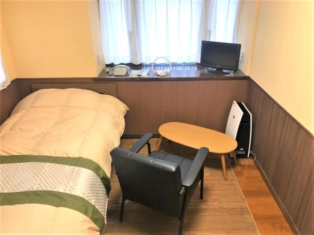 Letto o letti in una camera di Sanso Tanaka