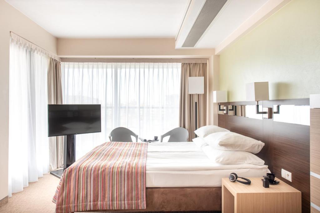 Postel nebo postele na pokoji v ubytování Hotel Arkon Park Gdańsk- Destigo Hotels