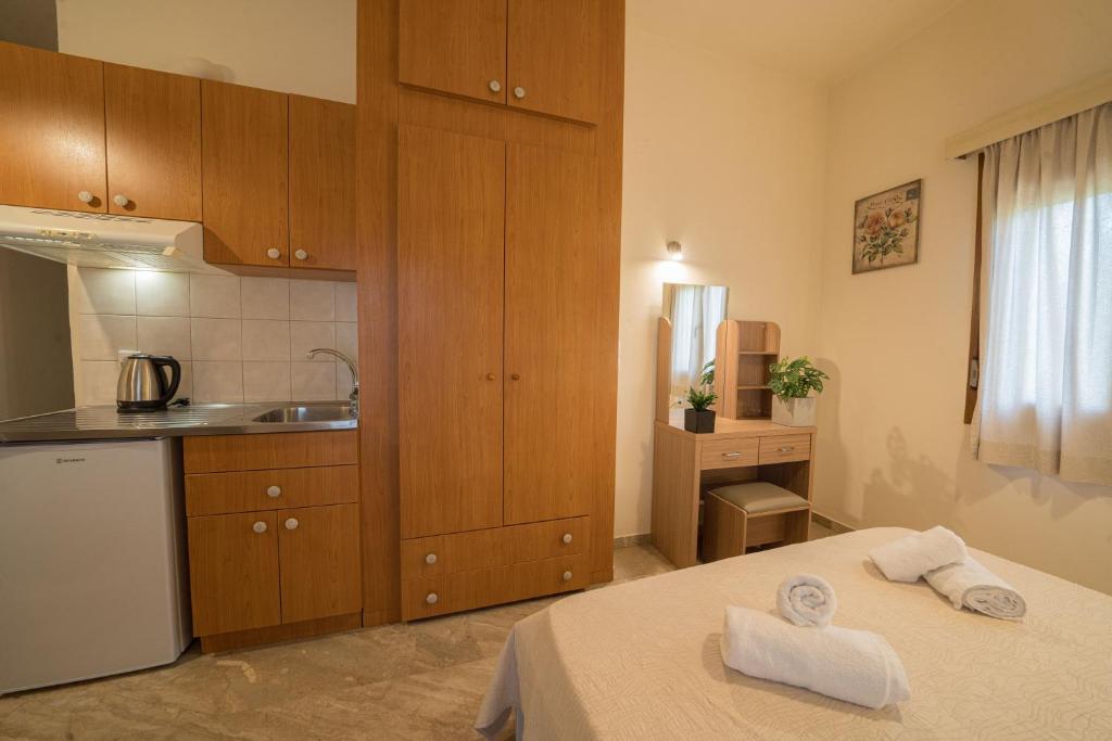 Postel nebo postele na pokoji v ubytování Frank Apartments