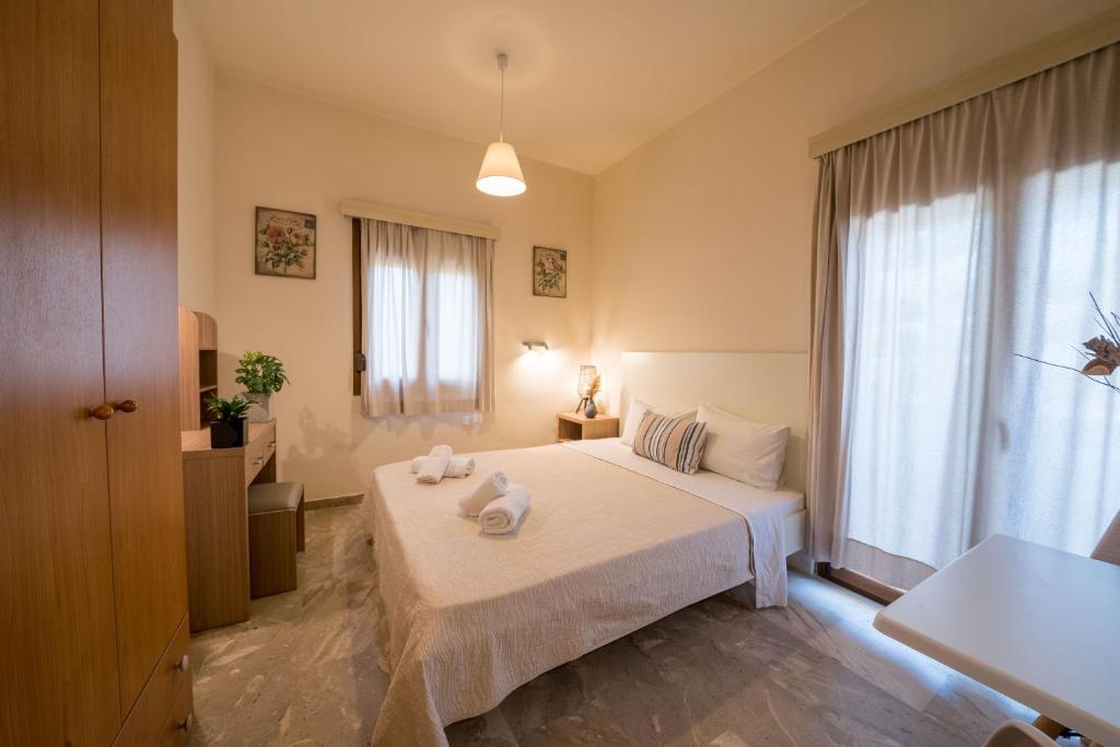 Postel nebo postele na pokoji v ubytování Frank Apartments