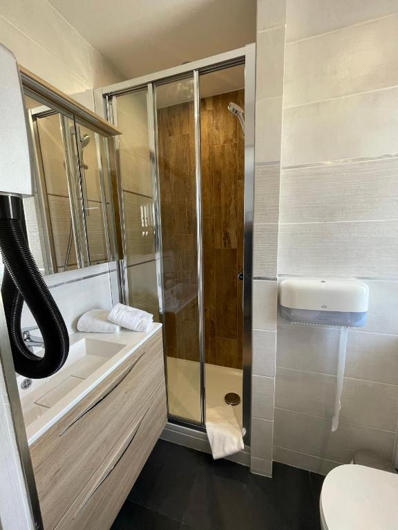 Koupelna v ubytování Hôtel Le Mirage