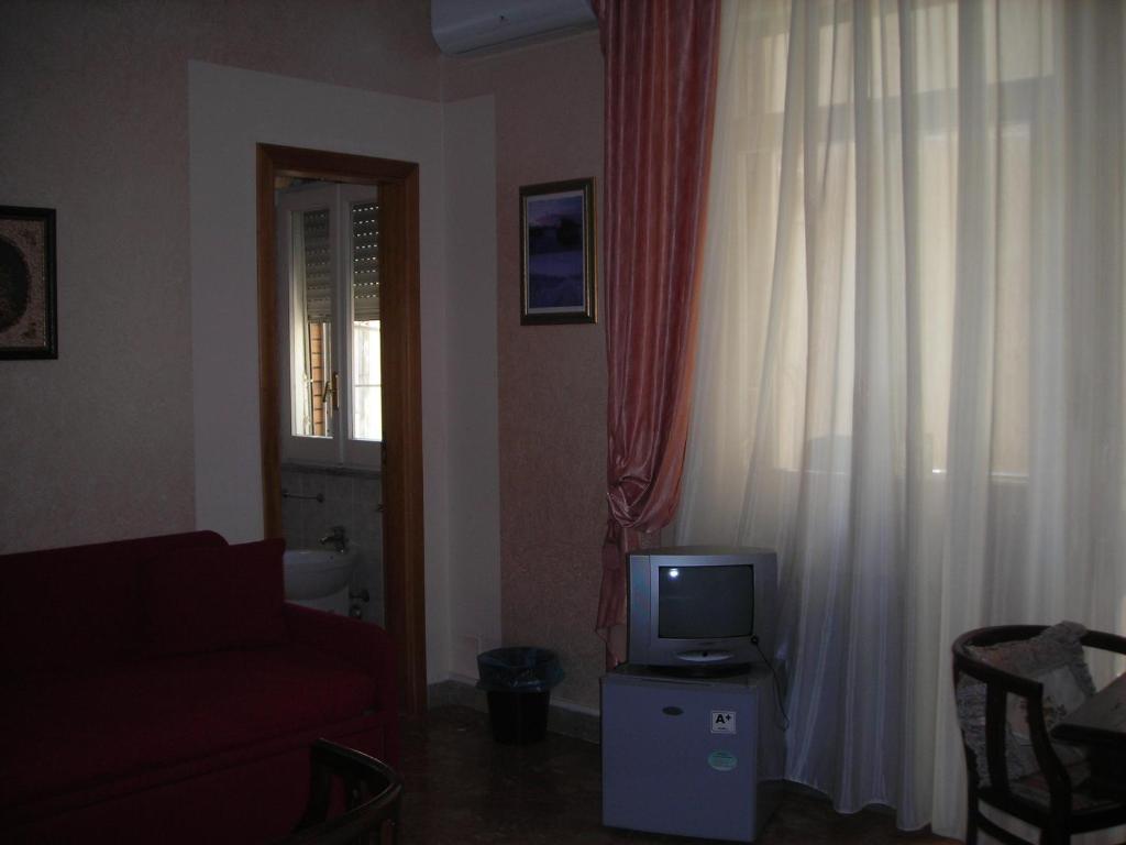 TV a/nebo společenská místnost v ubytování B&B Gelone