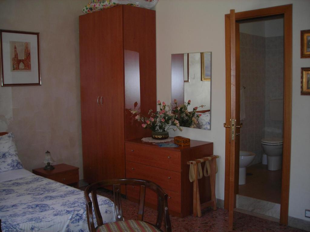Postel nebo postele na pokoji v ubytování B&B Gelone