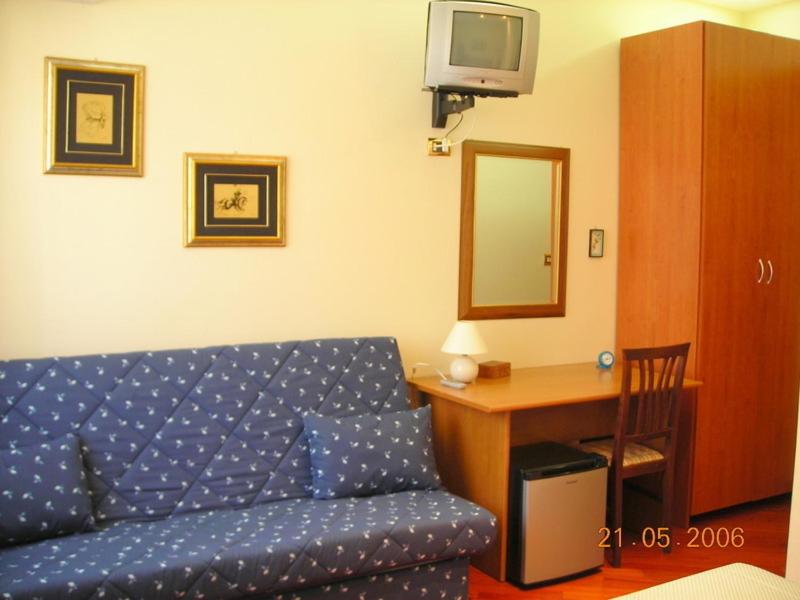 TV a/nebo společenská místnost v ubytování B&B Gelone
