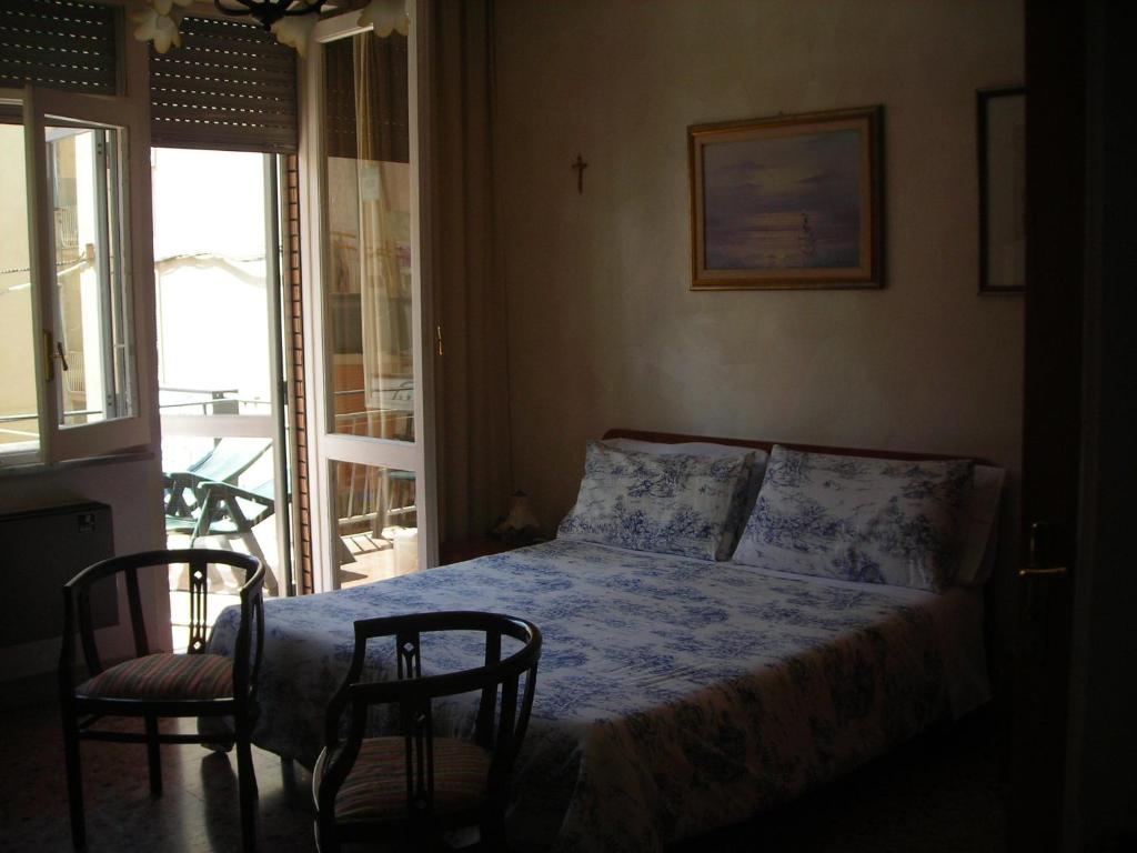 Postel nebo postele na pokoji v ubytování B&B Gelone