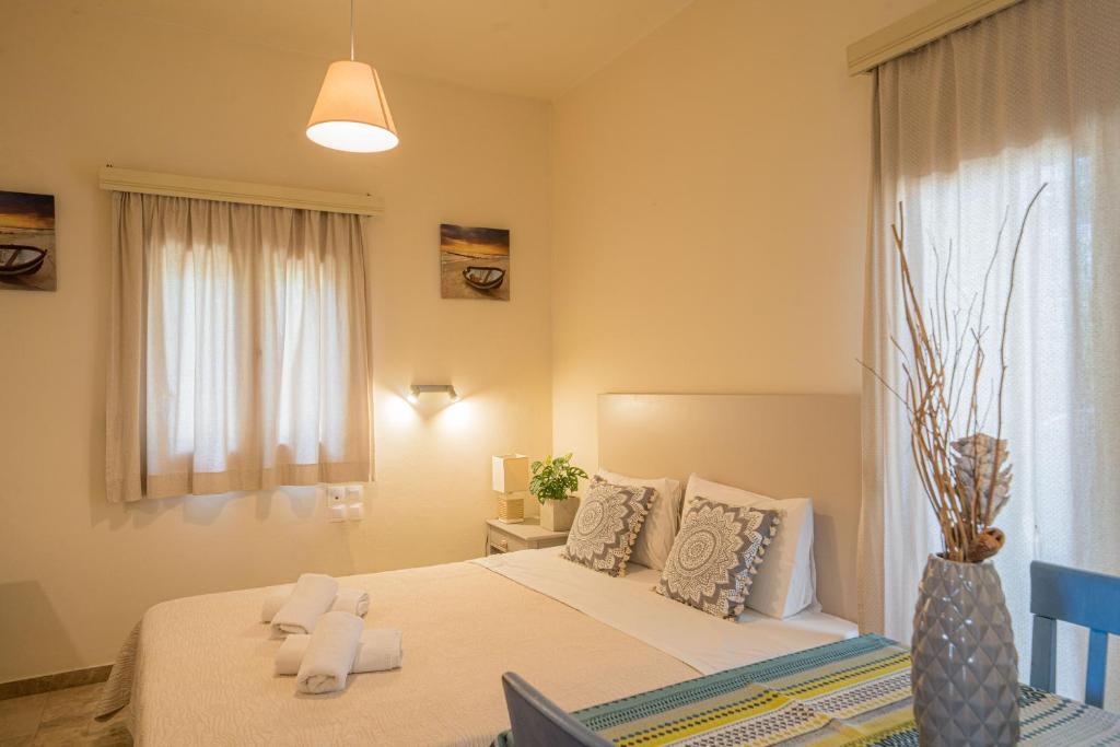 Postel nebo postele na pokoji v ubytování Frank Apartments
