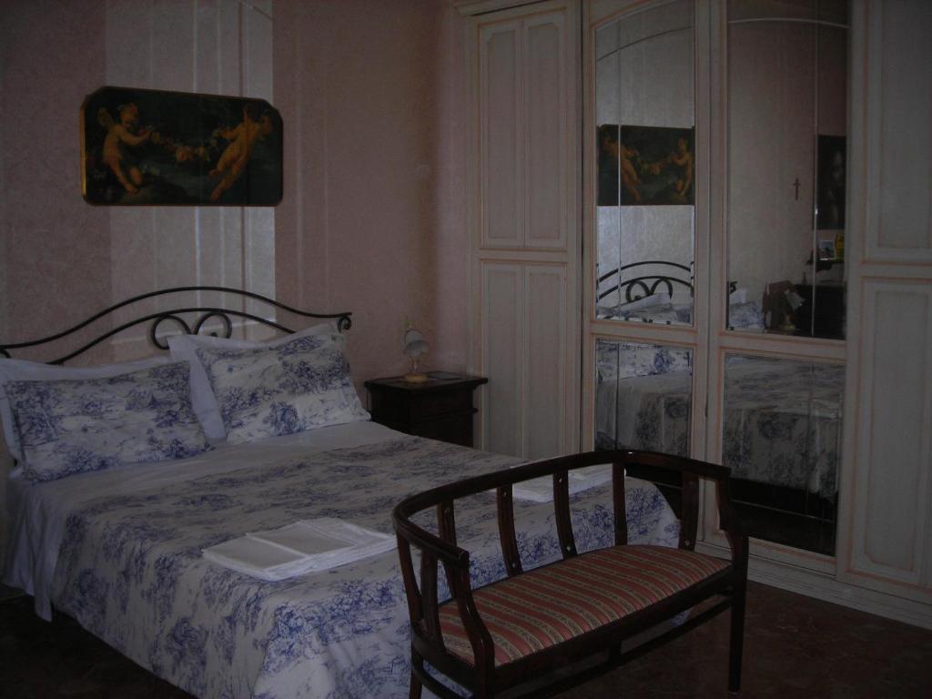 Postel nebo postele na pokoji v ubytování B&B Gelone
