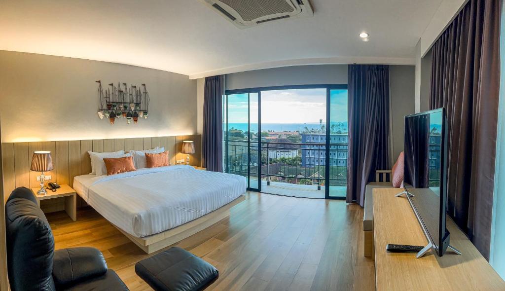 Postel nebo postele na pokoji v ubytování AVA SEA Resort Krabi, Ao Nang Beach